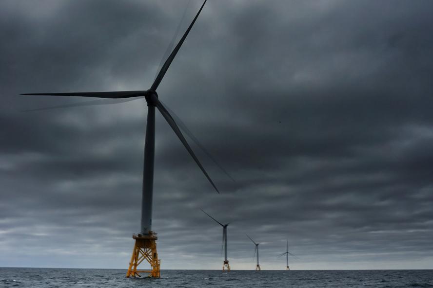 Block Island offshore wind turbines under dark clouds (Photo credit: Gerrit Wolken-Moehlmann)